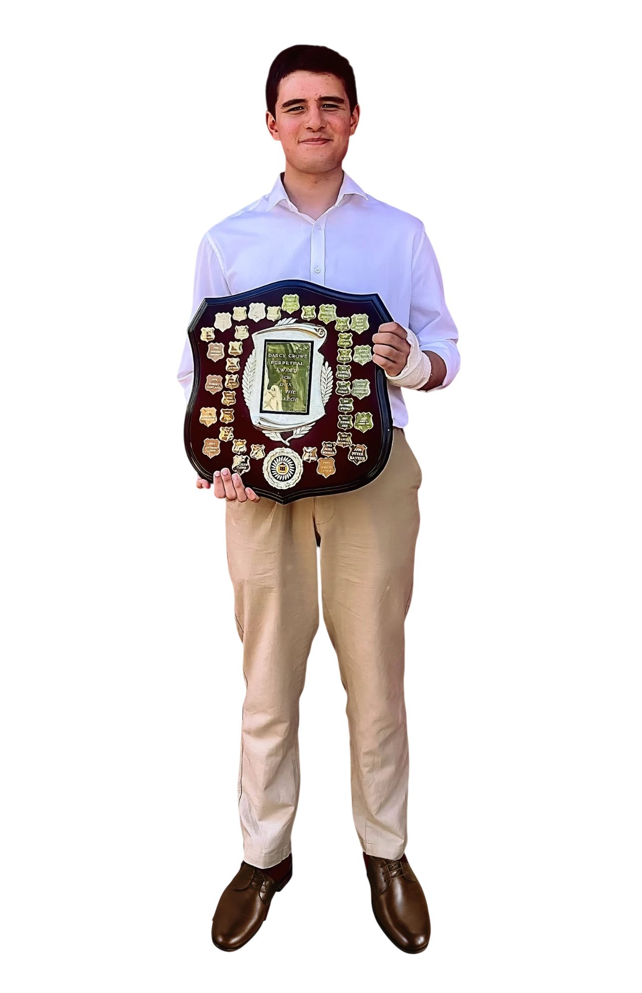 Jonathan Soares Caplice, Head of STEM, holding the Dux shield